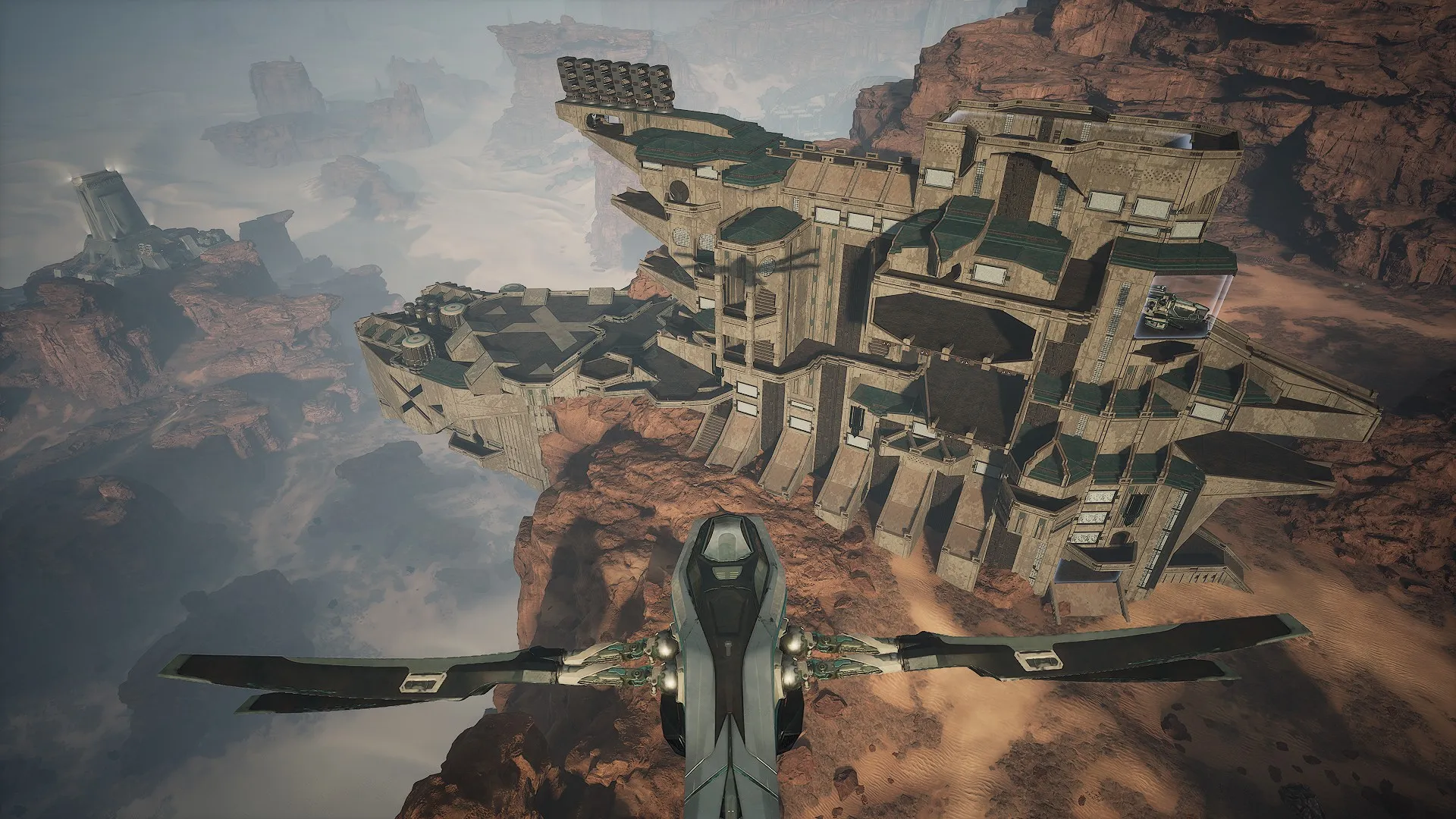 Wide exterior view of private hangars and main guild structure