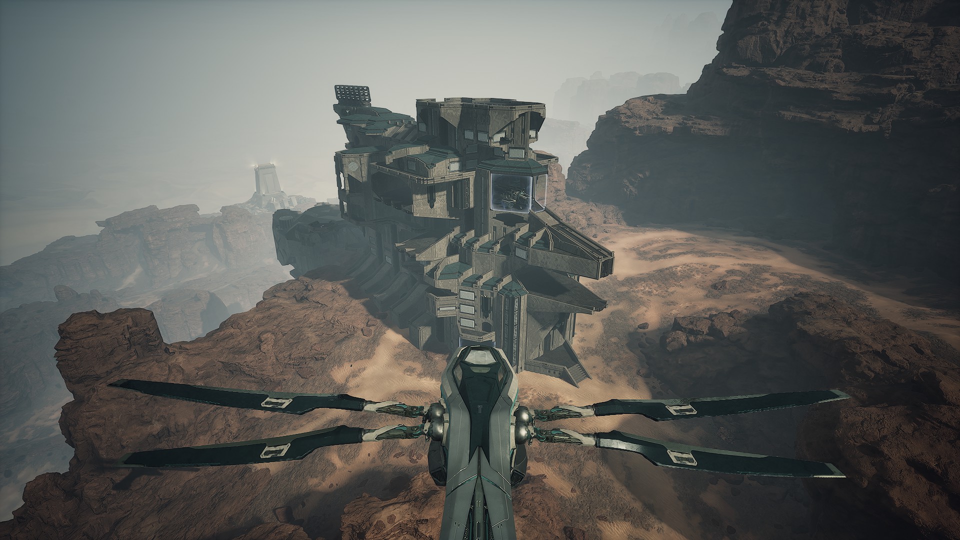 Wide aerial approach showing the Operations exterior massing